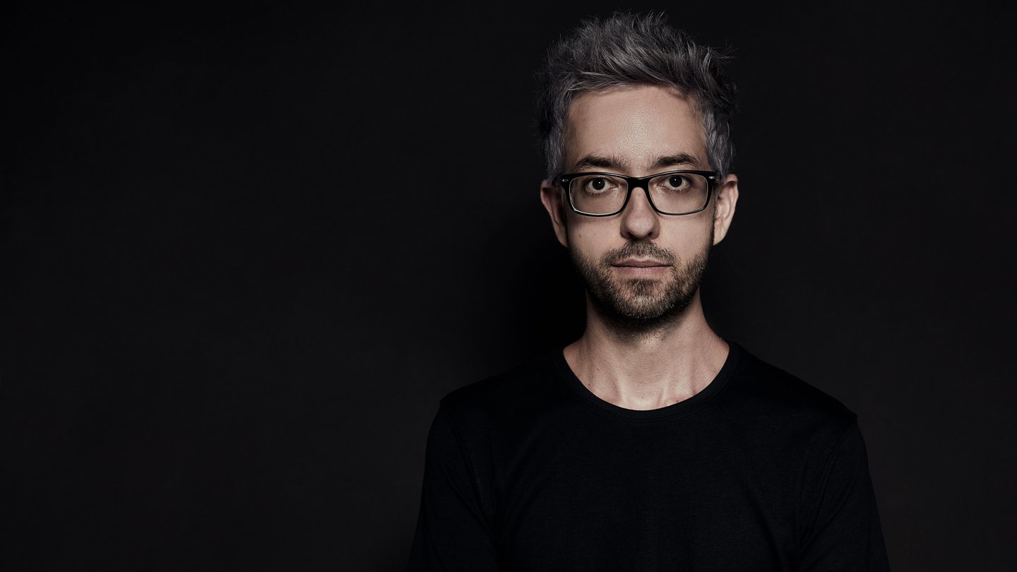 Photography of Ignacio in a dark background